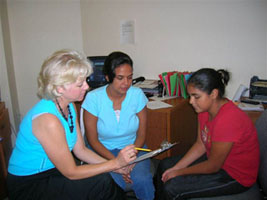 Debbie counseling woman and daughter